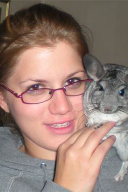 smiling woman with chinchilla